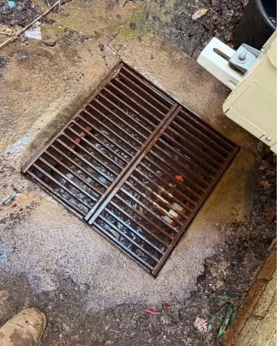 Grated commercial stormwater pit in Kingston after cleaning and drain clearing