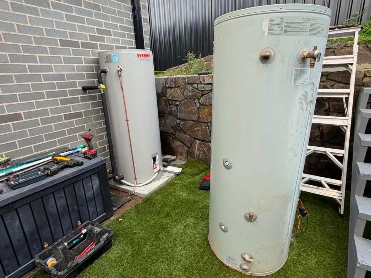 Replacement hot water system installed beside the old unit